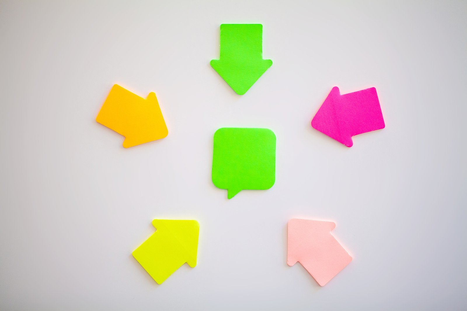 Colorful stickers on white wall. Empty Space for text